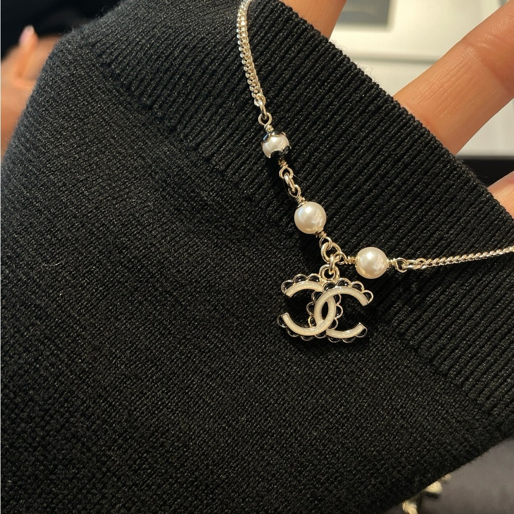 CHANEL Gold Bracelet with Pearl and Black Accents